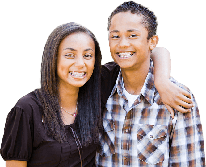 Two teens with braces smiling