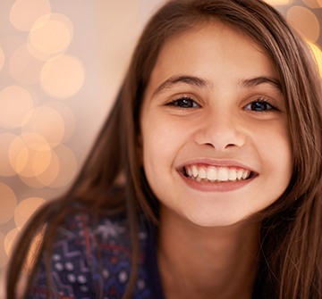 Young girl sharing smile after tooth colored fillings
