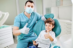a child visiting his dentist for treatment
