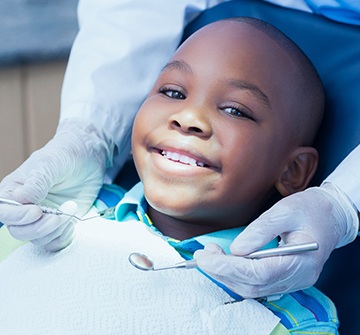 a child being treated by their emergency pediatric dentist 