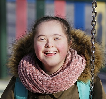 Little girl laughing after sedation dentistry visit