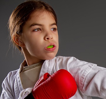 Teen girl with athletic mouthguard