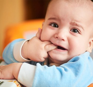 Little baby showing signs of teething in Clinton