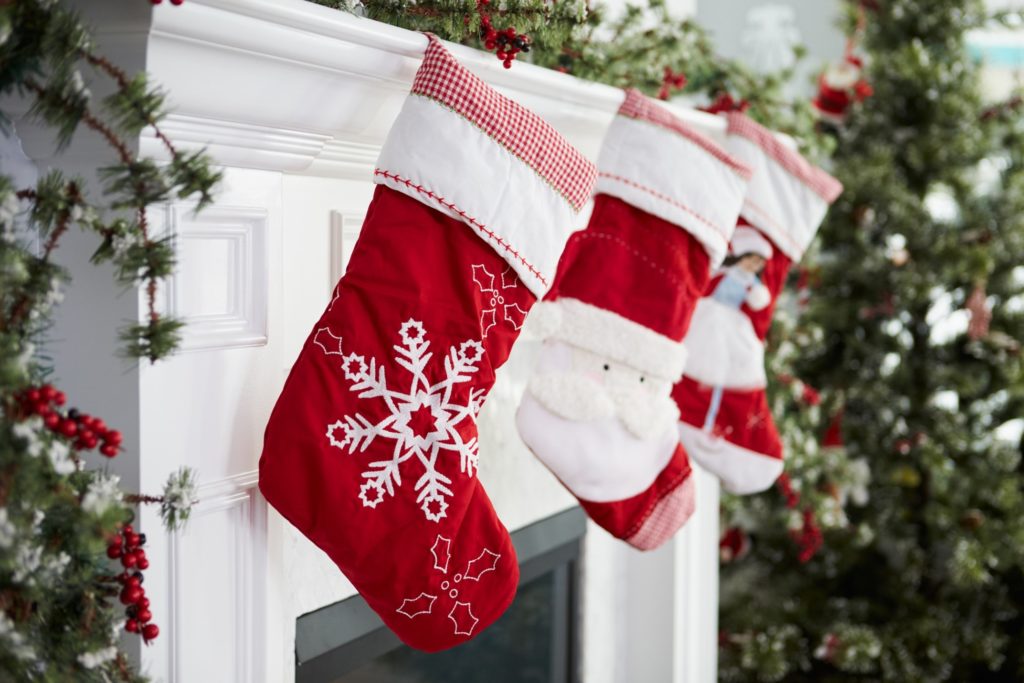 Holiday stockings hung on the fireplace